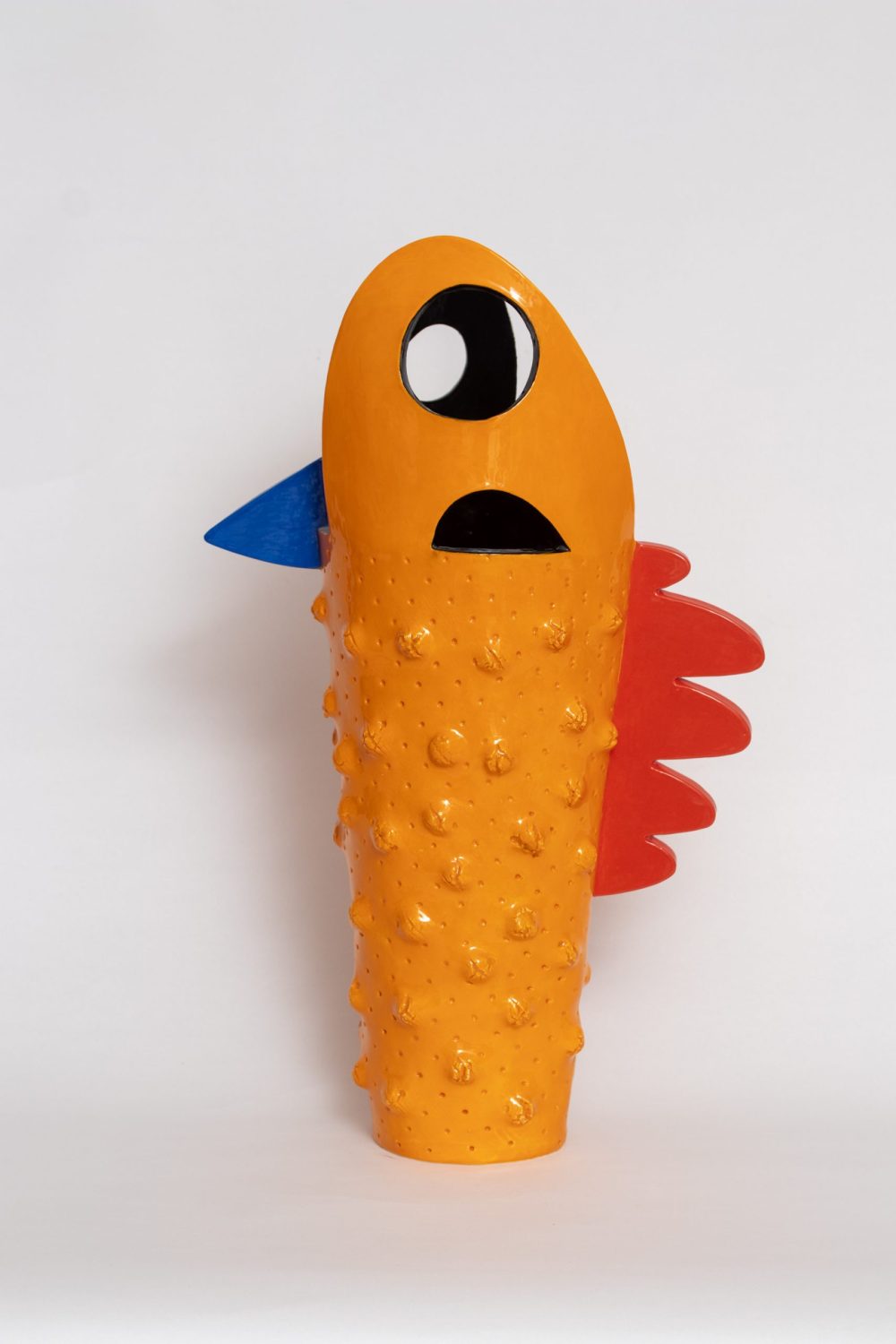 Orange, blue an red ceramic vessel