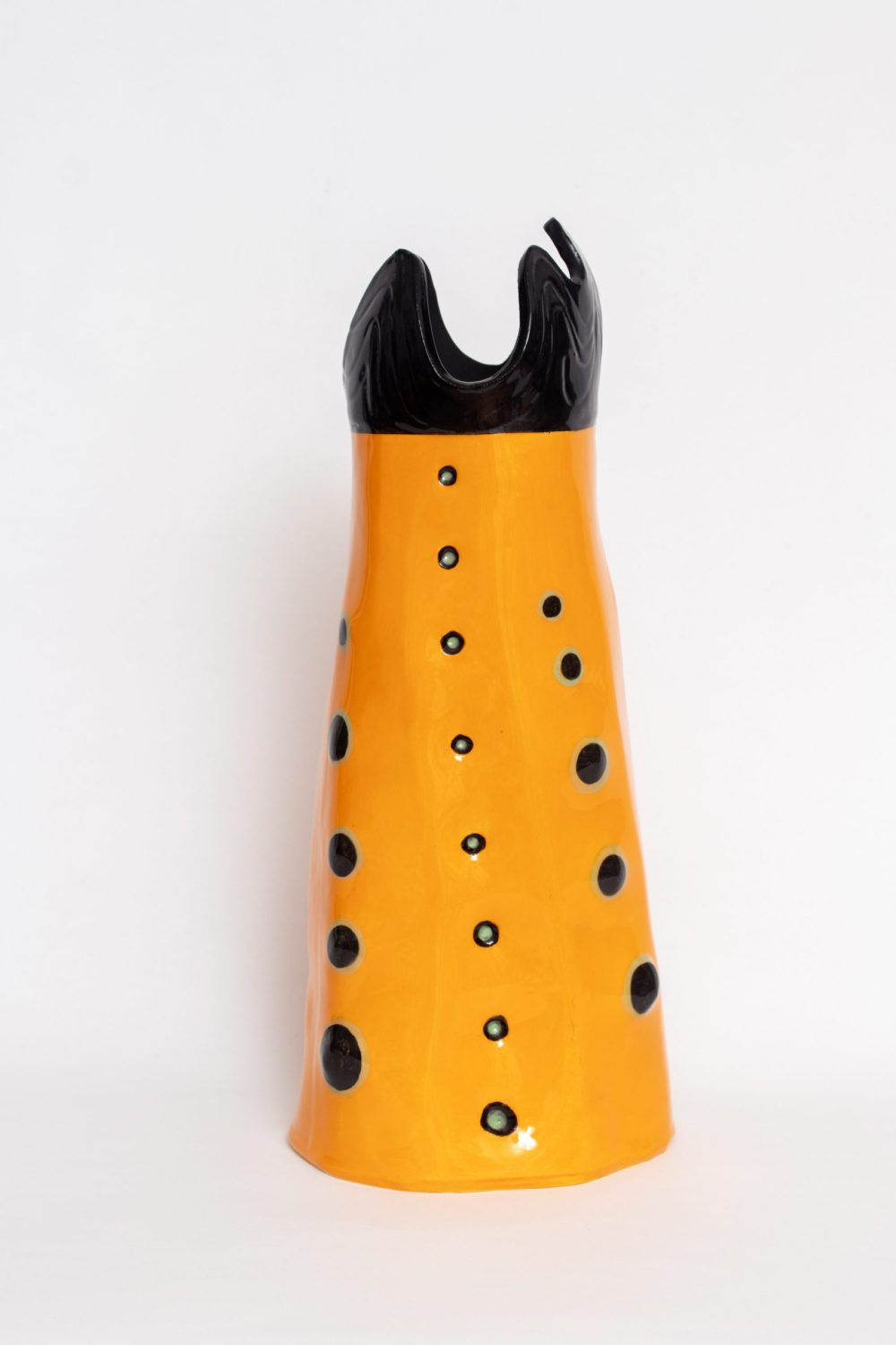 Orange and black sculptural vessel