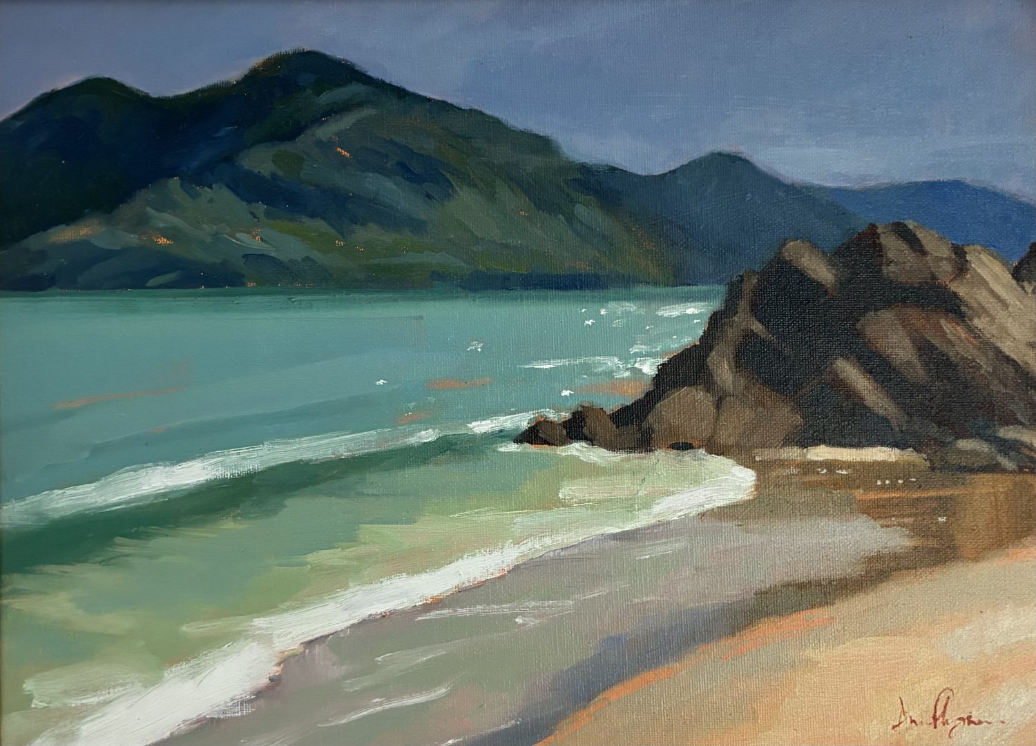 Connemara beach with dark mountains in the background